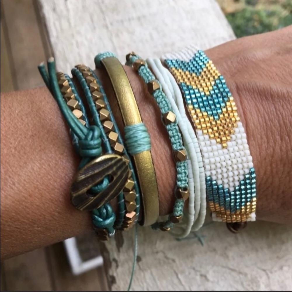 Hand beaded/stitched set of 5 bracelets.